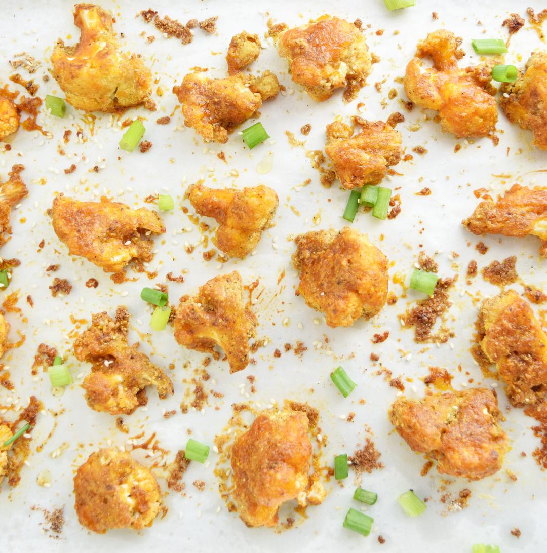 baked cauliflower florets topped with green onions