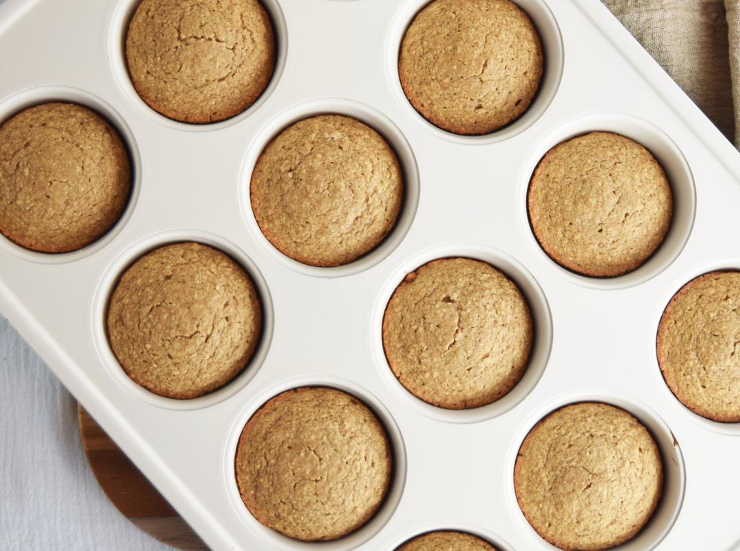 baked banana muffins in muffin pan