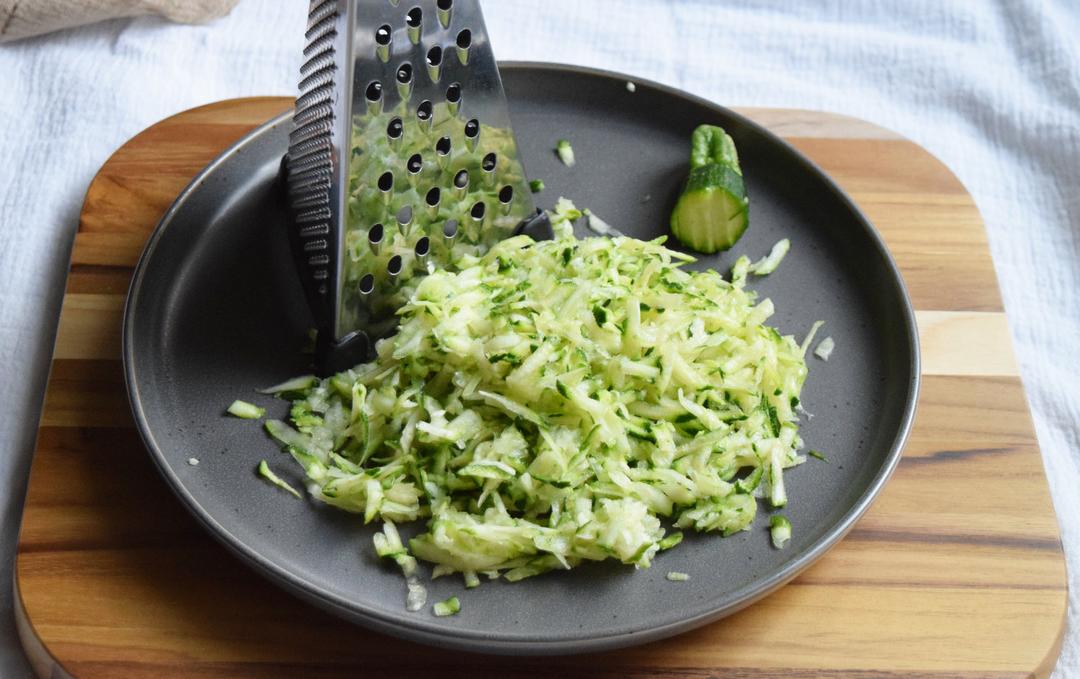 photo of grated zucchini on a plate