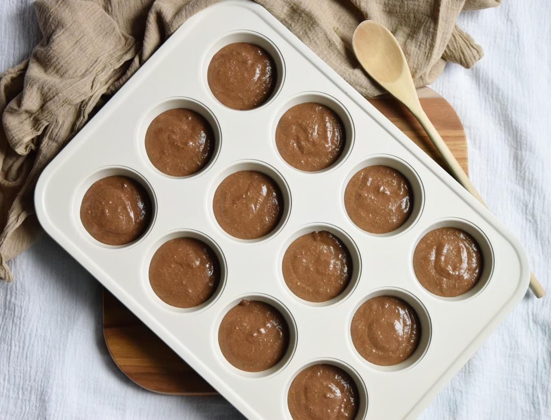 unbaked muffins in muffin tin