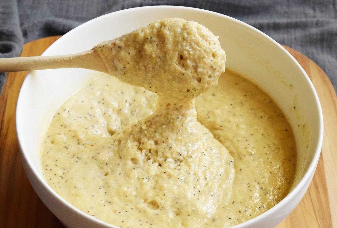 lemon poppyseed muffin batter mixed in a bowl