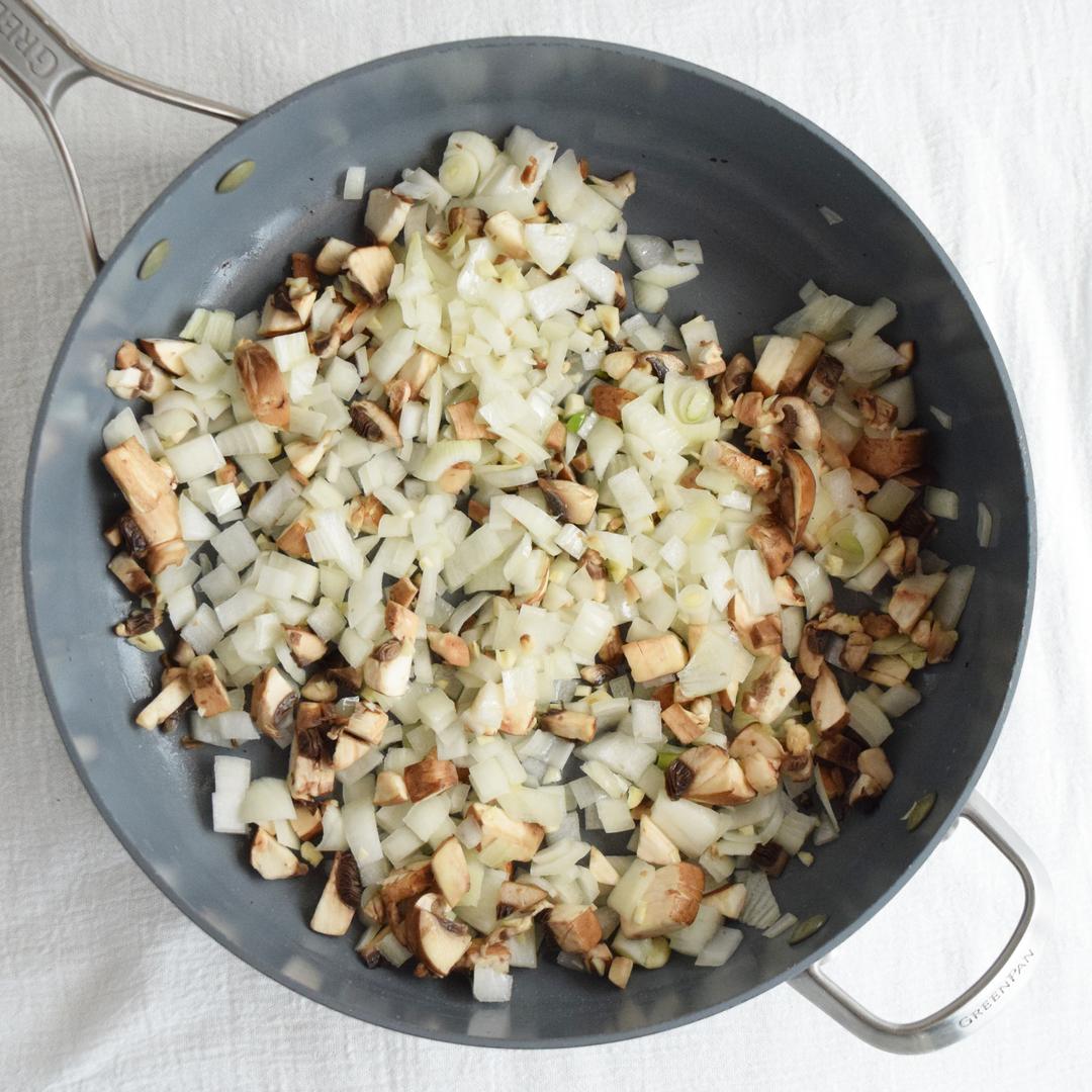 Saute garlic, onion, and mushrooms