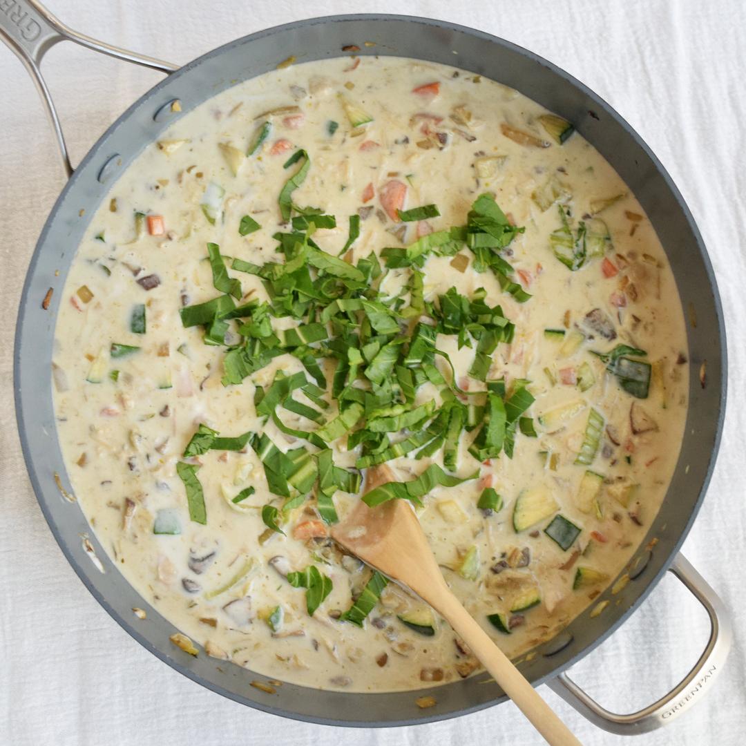 spicy green curry in pan